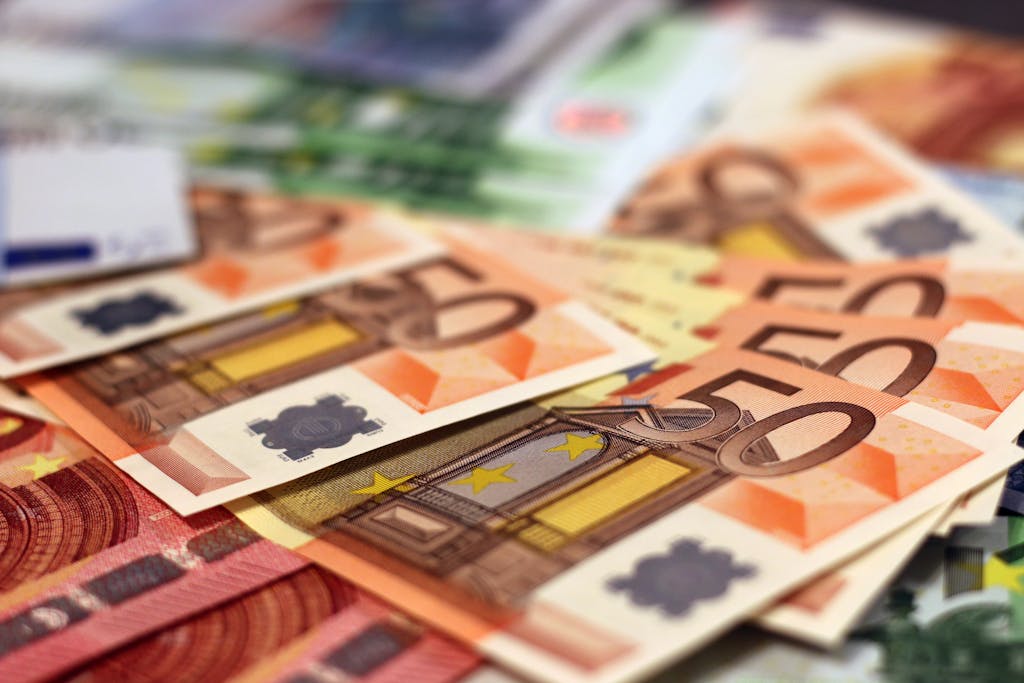 Stack of 50 euro banknotes, representing wealth and finance concepts.